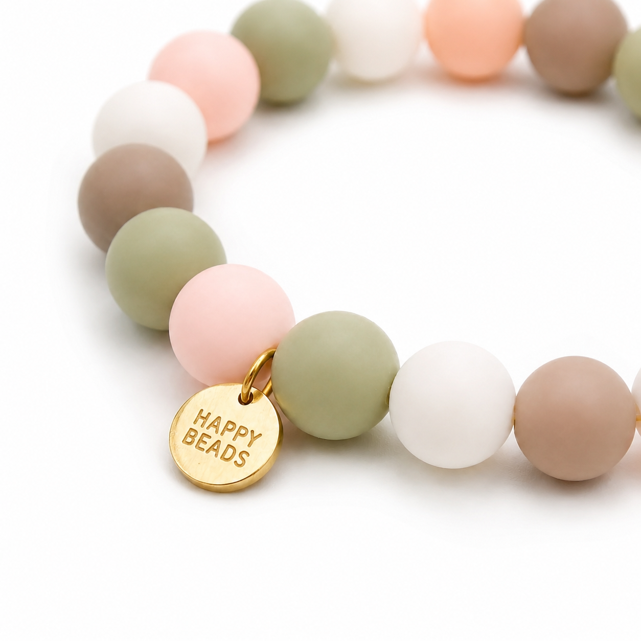 Close-up of Mia Baby Pink Dog Necklace by Happy Beads, featuring handmade silicone beads on a pink dog collar.