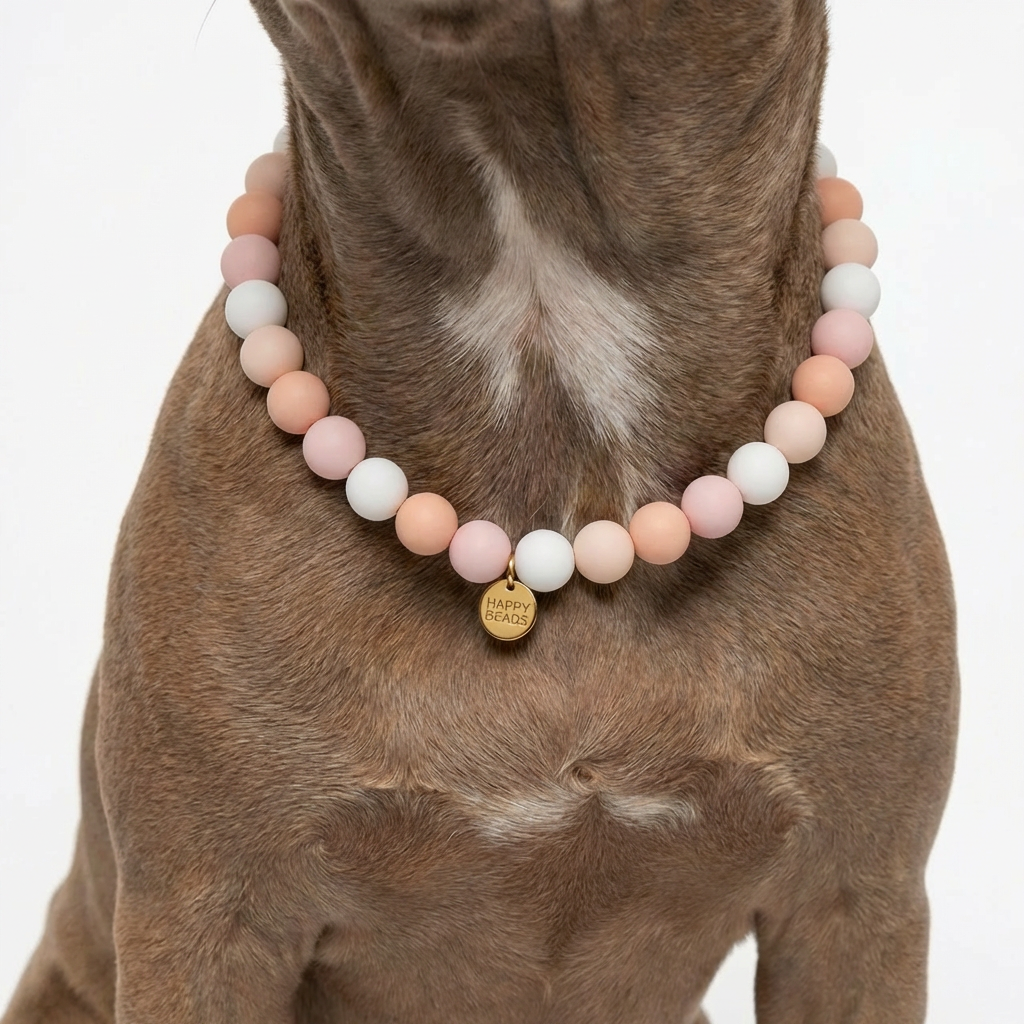 Close-up of Soft Peach handmade silicone bead dog necklace by Happy Beads, featuring smooth peach-colored beads on a durable strap.